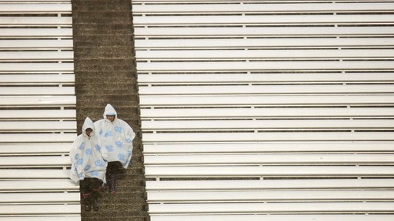 After debacle in driving rain, Heels await Hurricanes